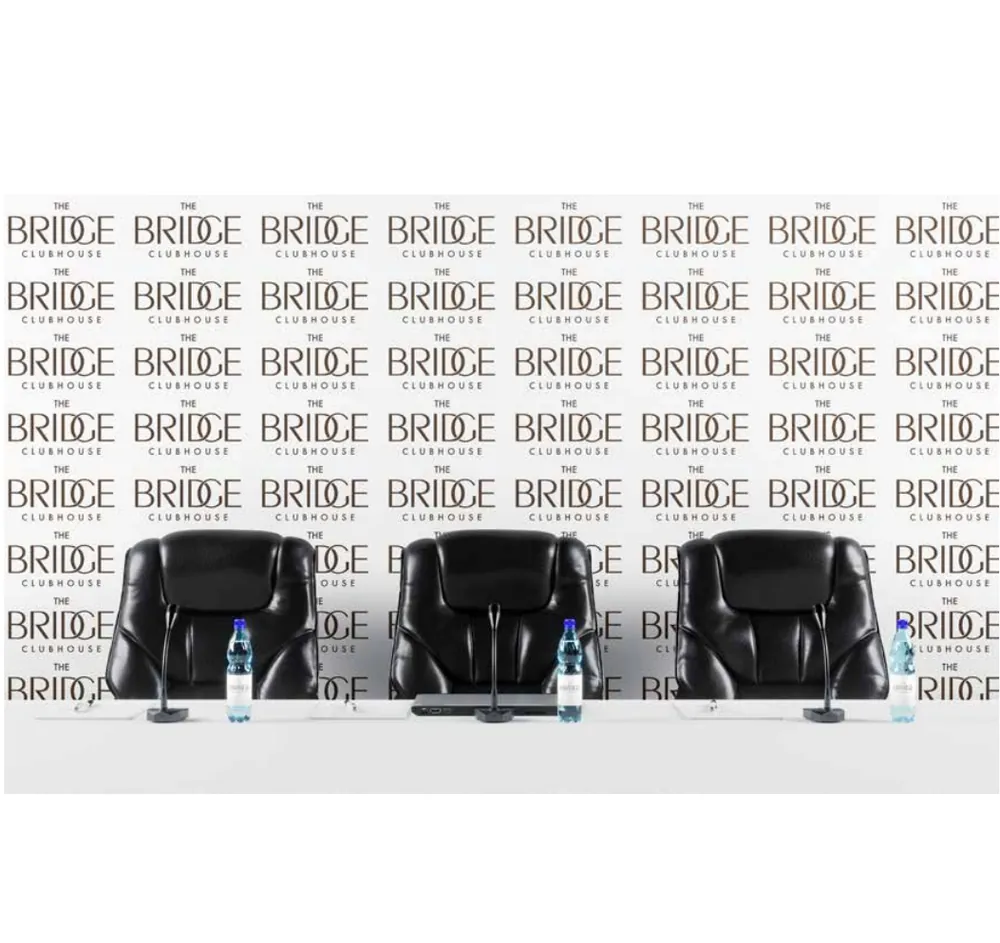 Event backdrop, branded with The Bridge Clubhouse identity