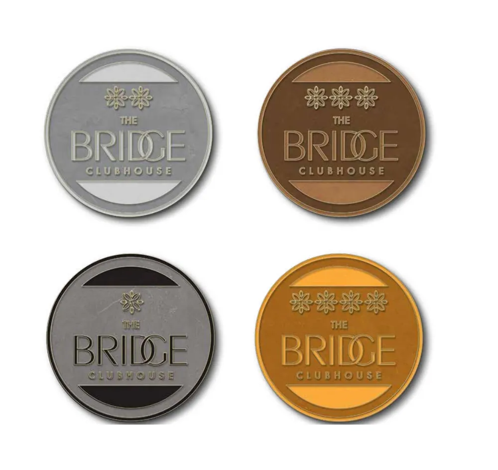 Membership coins, branded with The Bridge Clubhouse identity