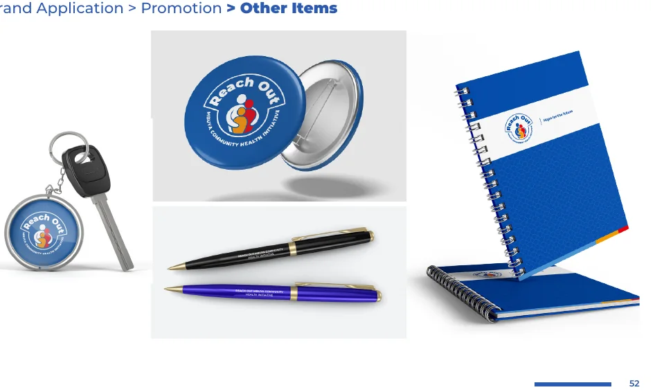 Badge, keyring, pens and notebook, branded with the Reach Out Mbuya identity