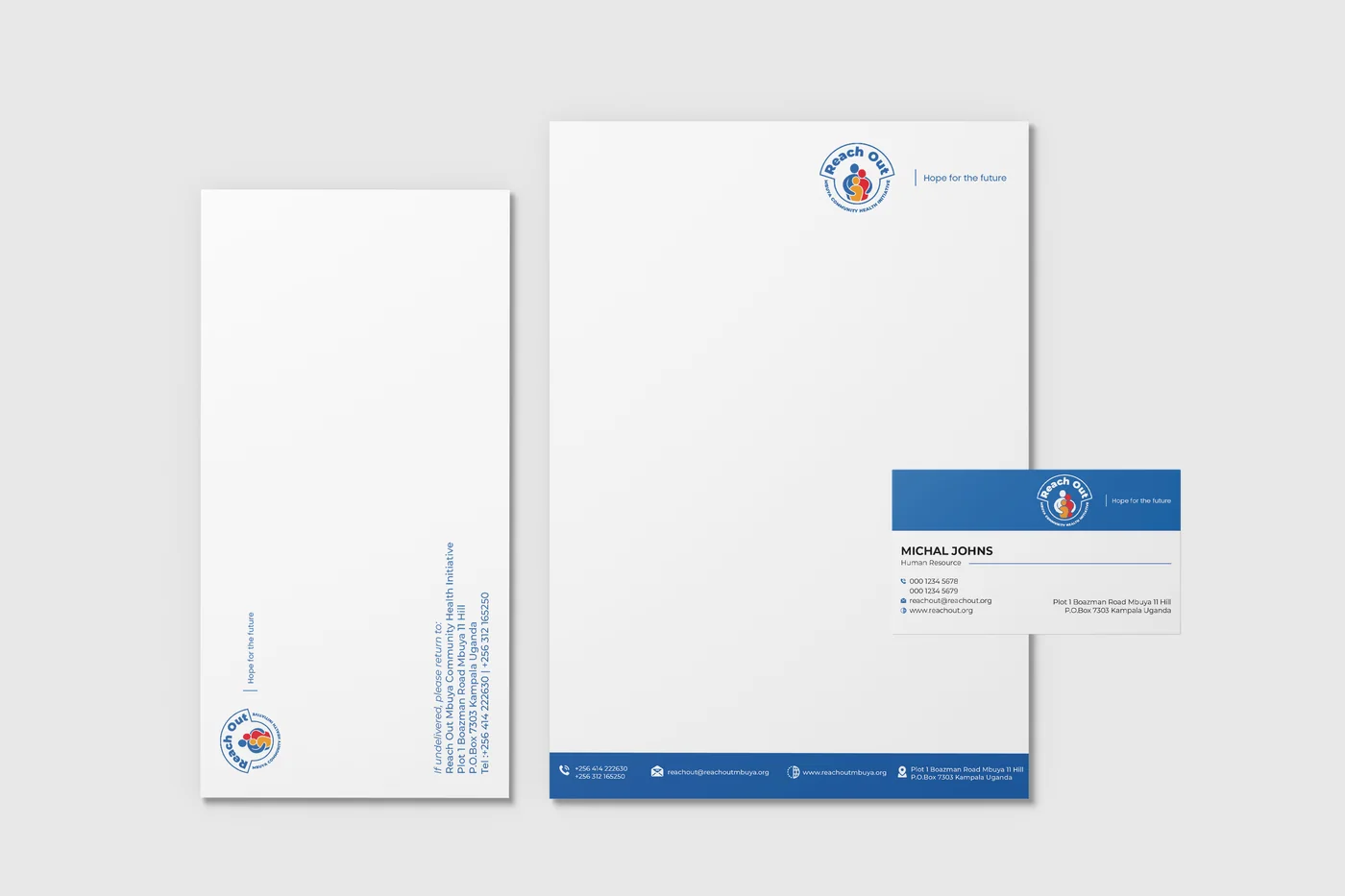 Letterhead, envelope and card, branded with the Reach Out Mbuya identity